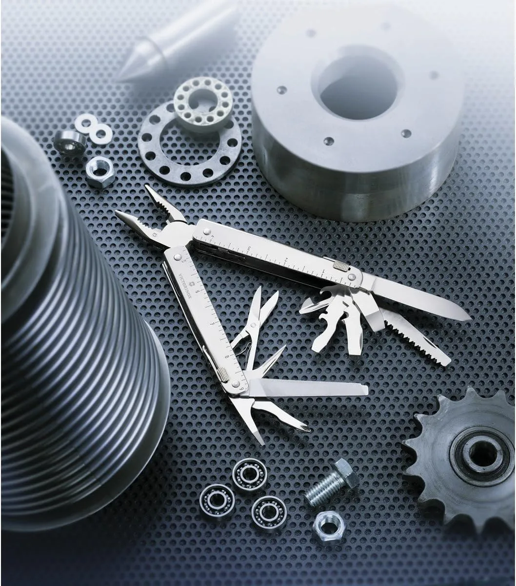 Victorinox Swiss Tool Swiss Army Knife, 24 Function Swiss Made Multi-Tool with Needle-Nose Pliers, Wire Cutters and Large Blade - Silver